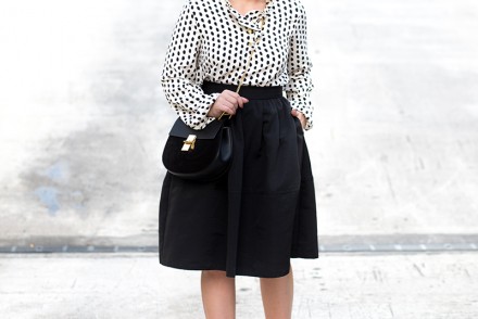 ruffled dotted blouse, black full skirt